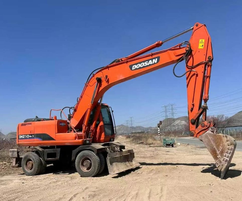 حفاری چرخ دار دوسان DH210 استفاده شده با رانش هیدرولیک و وزن کار